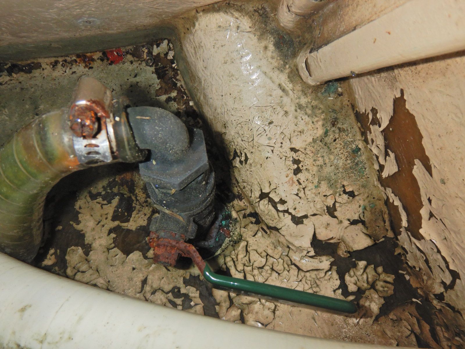 Severely corroded bonded seacock and skin-fitting flagged for immediate replacement