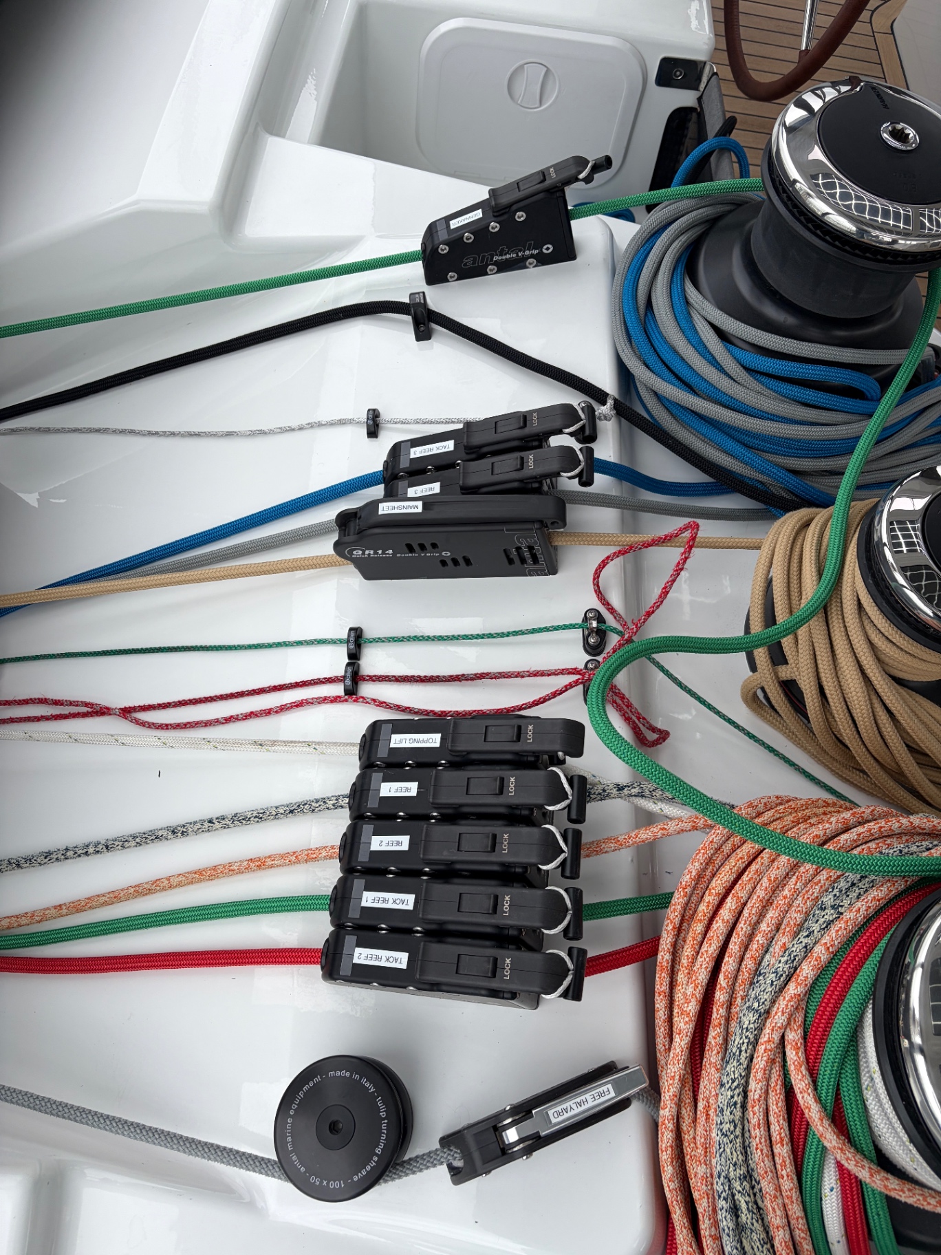 Antal rope clutches, winches and colour-coded running rigging on the coachroof